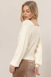 SUÉTER ENTRECRUZADO BEIGE